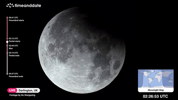 A screenshot from timeanddate.com’s live stream of the September 2024 partial lunar eclipse.